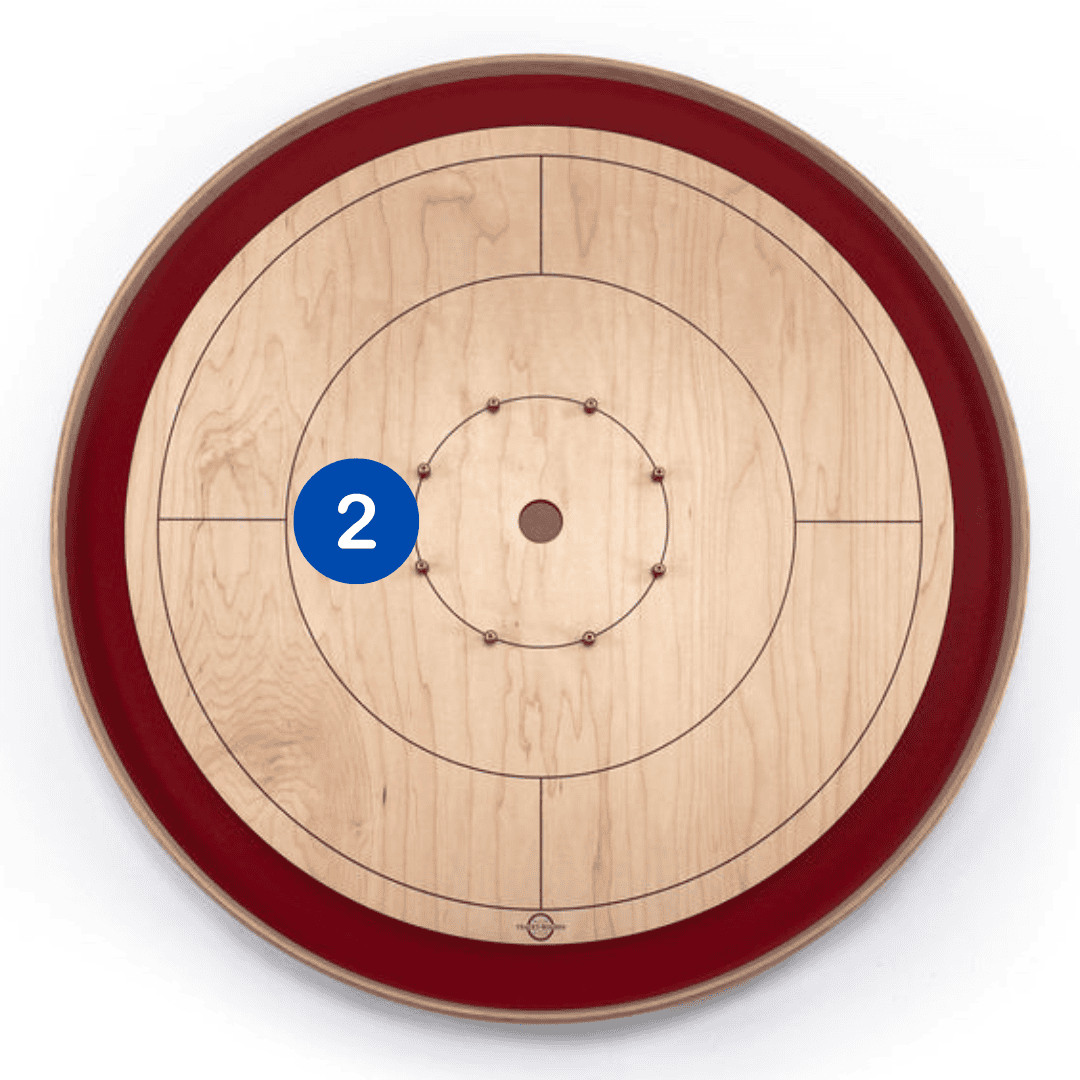 A Tracey Crokinole Board with a 2 in the 10 region, centred with the left quadrant boundary line